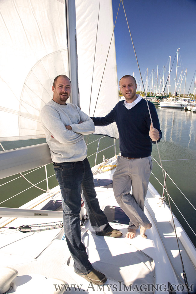 A casual portrait of two brothers on a sailboat