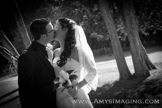 Black and white wedding kiss photo